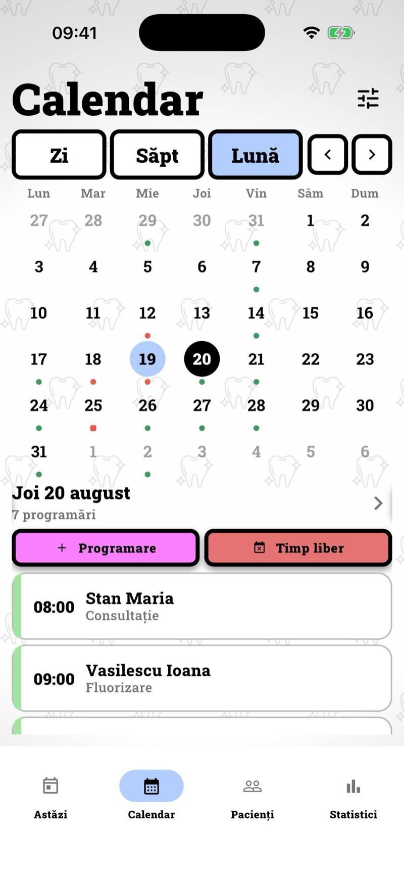 Calendarul pe lună, cu puncte colorate sub zile
